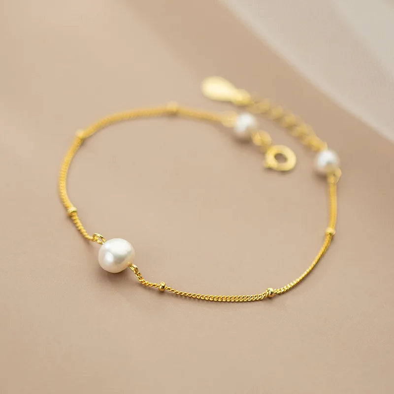 Radiant Pearl Charm Bracelet