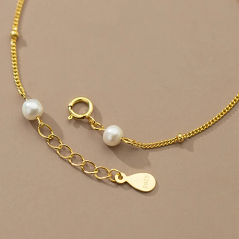 Radiant Pearl Charm Bracelet