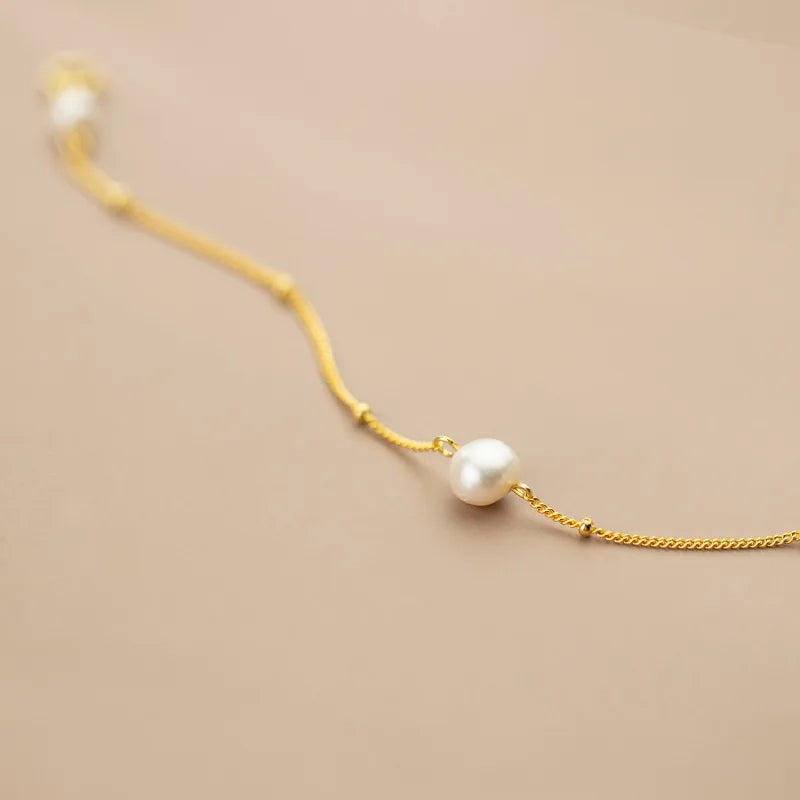 Radiant Pearl Charm Bracelet